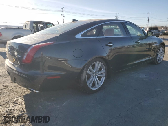 2013 Jaguar XJ with VIN SAJWA2GB0DLV43865, listed as a Copart auction lot 79693934 with 0 mi miles and Salvage Title. Bid and sale history available at carsss.com. Image 3.