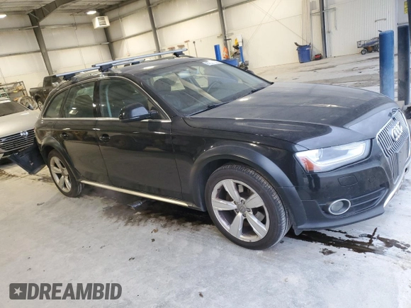 2014 Audi allroad Premium Plus with VIN WA1UFAFL4EA040939, listed as a Copart auction lot 87587215 with 142,593 mi miles and Salvage Title. Bid and sale history available at carsss.com. Image 4.