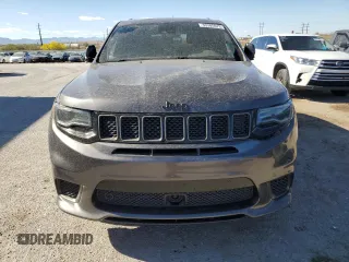 2018 Jeep Grand Cherokee Trackhawk with VIN 1C4RJFN96JC377074, listed as a Copart auction lot 53305975 with 27,625 mi miles and Salvage title. Bid and sale history available at DreamBid. Image 5.