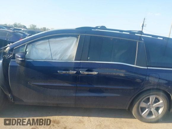2019 Honda Odyssey EX-L with VIN 5FNRL6H75KB054465, listed as a IAAI auction lot 41841488 with 141,790 mi miles. Bid and sale history available at carsss.com. Image 14.