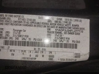 2015 Ford Focus Titanium with VIN 1FADP3J24FL277732, listed as a IAAI auction lot 41903397 with 238,138 mi miles and . Bid and sale history available at carsss.com. Image 9.