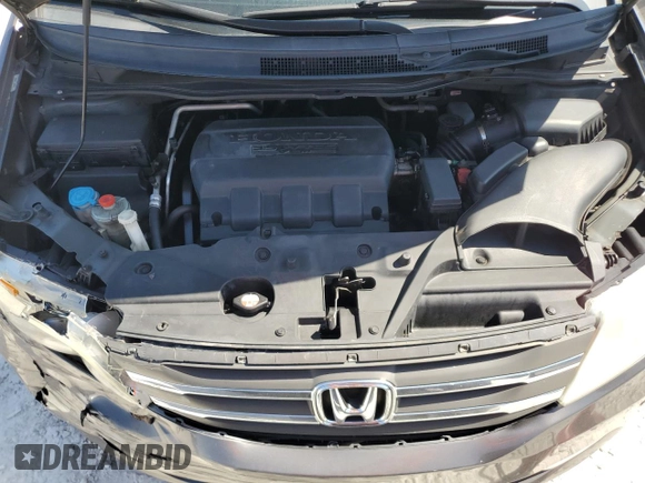 2011 Honda Odyssey Touring with VIN 5FNRL5H97BB501213, listed as a Copart auction lot 57314115 with 283,538 mi miles and Salvage title. Bid and sale history available at DreamBid. Image 11.