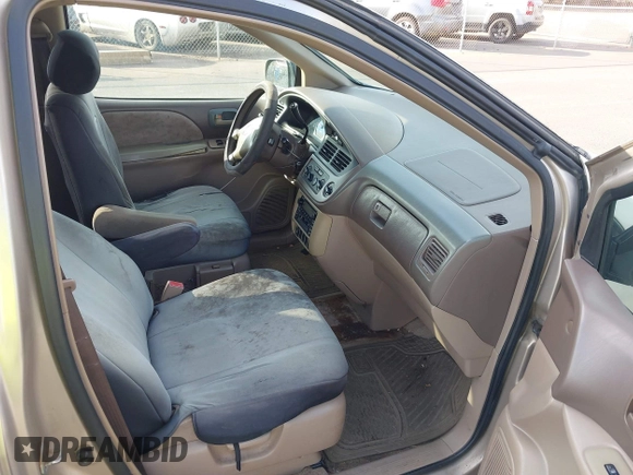 2002 Toyota Sienna LE with VIN 4T3ZF13C82U457803, listed as a IAAI auction lot 41198246 with 185,445 mi miles and . Bid and sale history available at DreamBid. Image 5.