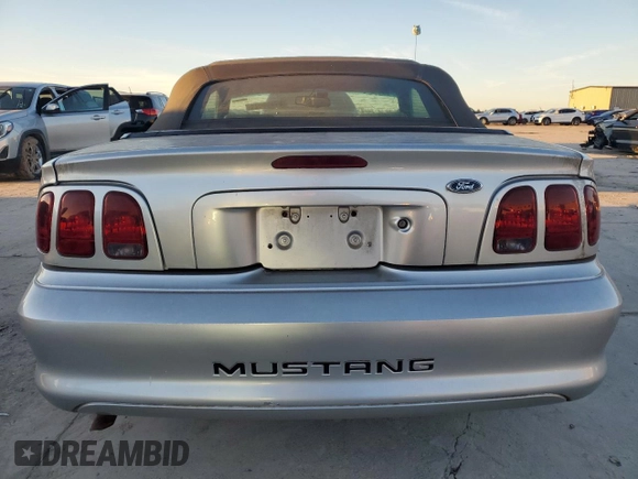 1998 Ford Mustang with VIN 1FAFP4444WF212096, listed as a Copart auction lot 87106074 with 107,664 mi miles and Clean Title. Bid and sale history available at carsss.com. Image 6.
