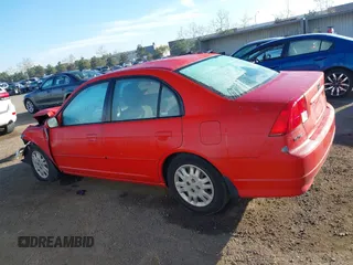 2004 Honda Civic LX with VIN 2HGES16584H548825, listed as a IAAI auction lot 41477784 with 152,581 mi miles. Bid and sale history available at carsss.com. Image 14.