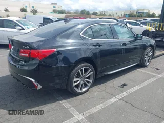 2019 Acura TLX w/Advance Pkg with VIN 19UUB3F85KA005610, listed as a IAAI auction lot 41700878 with 66,254 mi miles. Bid and sale history available at carsss.com. Image 4.