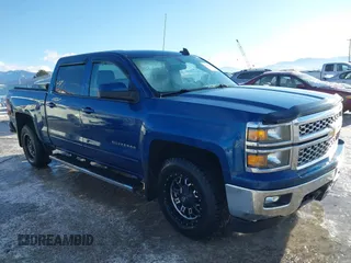 2015 Chevrolet Silverado 1500 LT with VIN 3GCUKRECXFG286057, listed as a IAAI auction lot 41382890 with 157,442 mi miles. Bid and sale history available at carsss.com. Image 1.