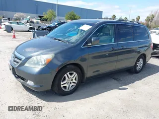2005 Honda Odyssey TOURING with VIN 5FNRL38885B082482, listed as a IAAI auction lot 41879897 with 159,667 mi miles. Bid and sale history available at carsss.com. Image 17.