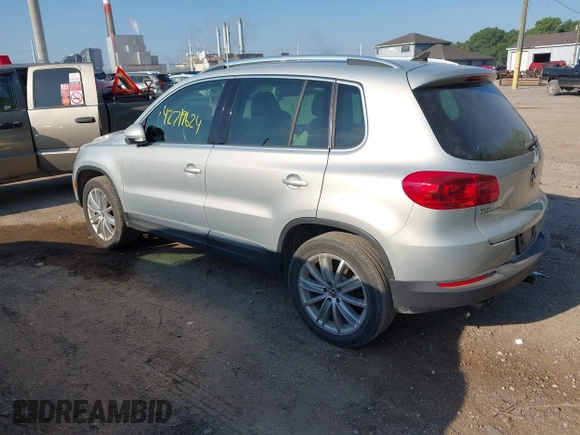 2012 Volkswagen Tiguan SE with VIN WVGBV7AX7CW580259, listed as a IAAI auction lot 42719624 with 94,710 mi miles and . Bid and sale history available at DreamBid. Image 3.