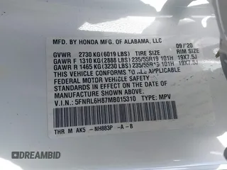 2021 Honda Odyssey Touring with VIN 5FNRL6H87MB015310, listed as a IAAI auction lot 41916339 with 58,808 mi miles. Bid and sale history available at carsss.com. Image 9.