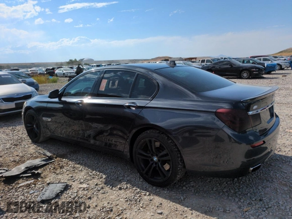 2011 BMW 7 Series 750i with VIN WBAKA8C59BCY36660, listed as a Copart auction lot 64260145 with 121,047 mi miles and Clean title. Bid and sale history available at DreamBid. Image 2.