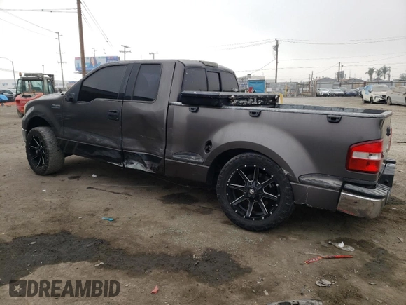 2004 Ford F-150 STX with VIN 1FTRX02W74KC08388, listed as a Copart auction lot 87290524 with 189,003 mi miles and Salvage title. Bid and sale history available at DreamBid. Image 2.