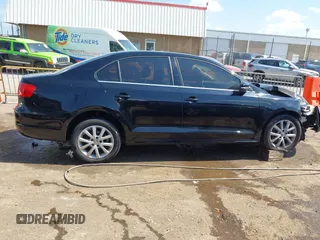 2013 Volkswagen Jetta SE z VIN 3VWDP7AJ3DM438668, wystawiony jako IAAI lot #42235014 z przebiegiem 128 406 mil mil oraz . Historia ofert i sprzedaży dostępna na DreamBid. Obrazek 13.