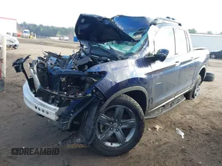 2022 Honda Ridgeline RTL-E z VIN 5FPYK3F7XNB029931, wystawiony jako IAAI lot #41213133 z przebiegiem Nie podano mil oraz . Historia ofert i sprzedaży dostępna na DreamBid. Obrazek 17.