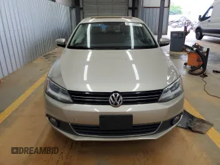 2014 Volkswagen Jetta TDI w/Premium with VIN 3VWLL7AJ9EM261908, listed as a Copart auction lot 60703205 with 128,892 mi miles and Salvage title. Bid and sale history available at DreamBid. Image 5.