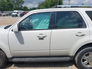 2011 Ford Escape Limited with VIN 1FMCU0E7XBKC61792, listed as a IAAI auction lot 42669924 with 164,765 mi miles and . Bid and sale history available at DreamBid. Image 13.