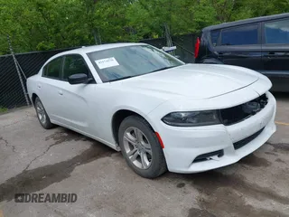 2023 Dodge Charger SXT with VIN 2C3CDXBG3PH518747, listed as a IAAI auction lot 42174270 with 51,956 mi miles. Bid and sale history available at carsss.com. Image 1.