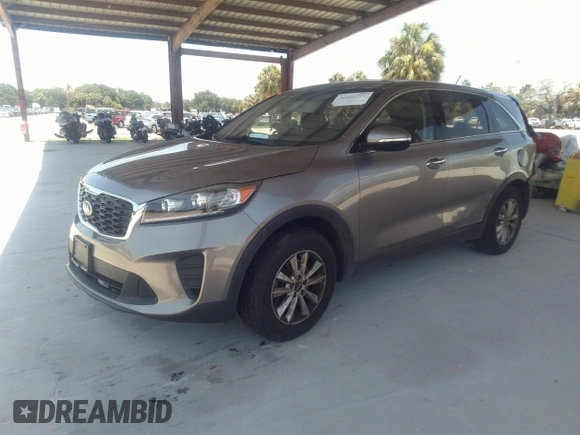 2019 Kia Sorento LX V6 with VIN 5XYPG4A52KG440780, listed as a IAAI auction lot 41673576 with 125,740 mi miles. Bid and sale history available at carsss.com. Image 2.