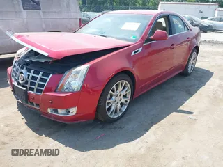 2012 Cadillac CTS Premium with VIN 1G6DS5E34C0132696, listed as a IAAI auction lot 42562931 with 83,025 mi miles and . Bid and sale history available at DreamBid. Image 2.