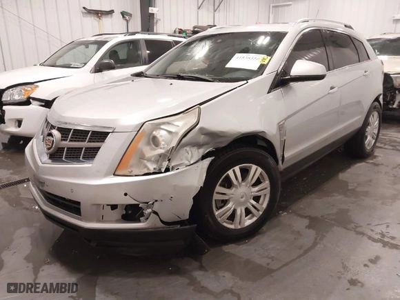 2010 Cadillac SRX Luxury Collection with VIN 3GYFNAEY5AS513989, listed as a IAAI auction lot 41538350 with 173,770 mi miles. Bid and sale history available at carsss.com. Image 6.