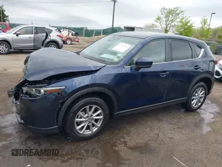 2023 Mazda CX-5 S Select with VIN JM3KFBBM5P0254047, listed as a IAAI auction lot 42069916 with 29,600 mi miles and . Bid and sale history available at carsss.com. Image 14.