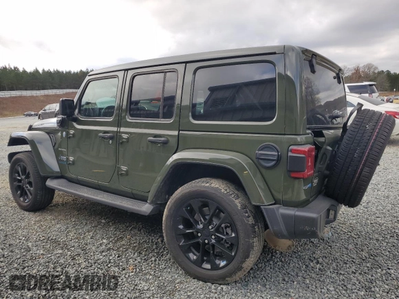 2023 Jeep Wrangler Sahara with VIN 1C4JJXP62PW553101, listed as a Copart auction lot 85543124 with 28,157 mi miles and Salvage Title. Bid and sale history available at DreamBid. Image 2.