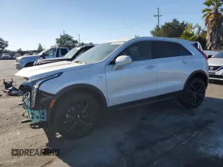 2021 Cadillac XT4 FWD Luxury z VIN 1GYAZAR49MF081955, wystawiony jako Copart lot #76611074 z przebiegiem 34 635 mil mil oraz Szkoda całkowita • Salvage title. Historia ofert i sprzedaży dostępna na DreamBid. Obrazek 1.