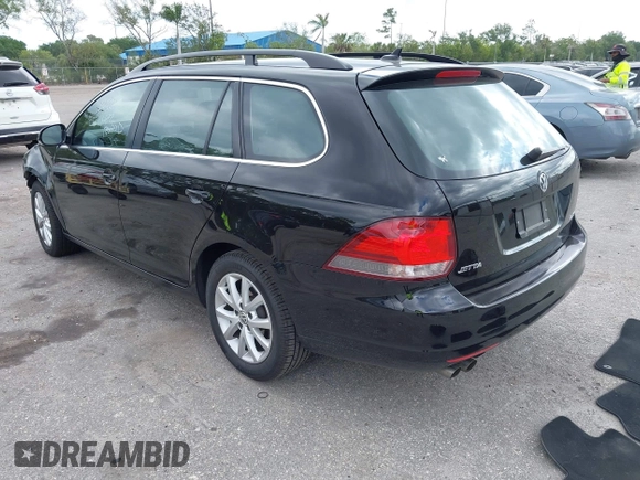 2013 Volkswagen Jetta SportWagen SE with VIN 3VWPX7AJ4DM655174, listed as a IAAI auction lot 42072632 with 65,899 mi miles. Bid and sale history available at carsss.com. Image 3.
