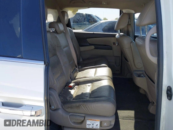 2014 Honda Odyssey Touring with VIN 5FNRL5H97EB037361, listed as a IAAI auction lot 42106742 with 198,279 mi miles and . Bid and sale history available at DreamBid. Image 8.