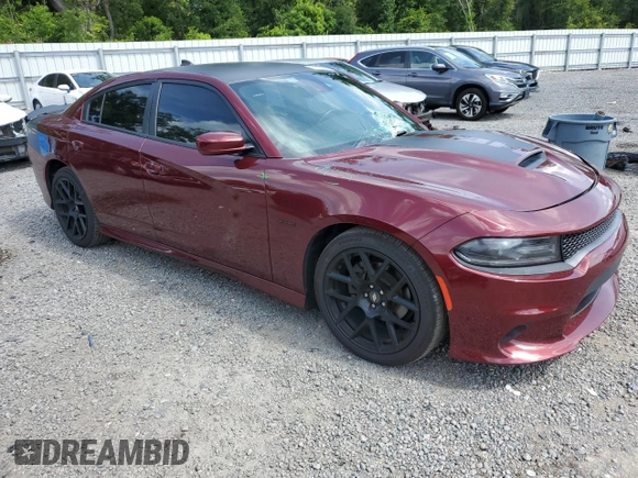 2017 Dodge Charger R/T with VIN 2C3CDXCT1HH543465, listed as a Copart auction lot 64038865 with 115,752 mi miles and Salvage title. Bid and sale history available at DreamBid. Image 4.