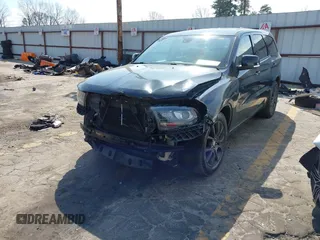 2016 Dodge Durango R/T with VIN 1C4SDHCT0GC475240, listed as a IAAI auction lot 41791441 with 180,773 mi miles and . Bid and sale history available at DreamBid. Image 2.