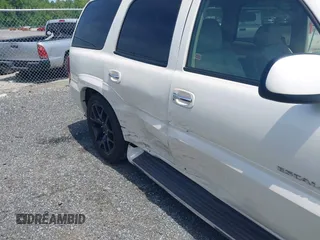 2003 Cadillac Escalade z VIN 1GYEK63N43R222254, wystawiony jako IAAI lot #42228127 z przebiegiem 167 294 mil mil oraz . Historia ofert i sprzedaży dostępna na DreamBid. Obrazek 6.