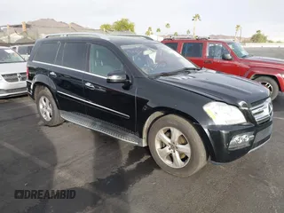 2011 Mercedes-Benz GL-Class GL 450 with VIN 4JGBF7BE1BA752615, listed as a IAAI auction lot 41075508 with 165,605 mi miles. Bid and sale history available at carsss.com. Image 1.