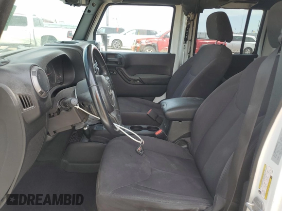 2015 Jeep Wrangler Unlimited Sport with VIN 1C4BJWDG2FL545561, listed as a Copart auction lot 60574045 with 83,592 mi miles and Salvage title. Bid and sale history available at DreamBid. Image 7.