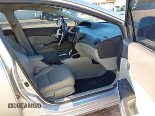 2012 Honda Civic EX-L with VIN 19XFB2F99CE047996, listed as a IAAI auction lot 41596688 with 124,523 mi miles and . Bid and sale history available at DreamBid. Image 5.