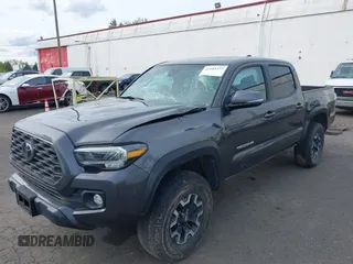 2020 Toyota Tacoma SR5 with VIN 3TMCZ5AN7LM321061, listed as a IAAI auction lot 41985533 with 32,111 mi miles and . Bid and sale history available at DreamBid. Image 6.