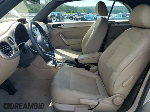 2015 Volkswagen Beetle with VIN 3VW5A7AT9FM815899, listed as a Copart auction lot 63074125 with 77,214 mi miles and Salvage title. Bid and sale history available at DreamBid. Image 7.