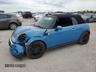 2014 MINI Convertible z VIN WMWZN3C57ET570016, wystawiony jako Copart lot #54565815 z przebiegiem 74 742 mil mil oraz Szkoda całkowita • Salvage title. Historia ofert i sprzedaży dostępna na DreamBid. Obrazek 1.