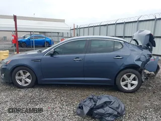 2015 Kia Optima LX z VIN KNAGM4A78F5588728, wystawiony jako IAAI lot #42116653 z przebiegiem 203 145 mil mil oraz . Historia ofert i sprzedaży dostępna na DreamBid. Obrazek 14.