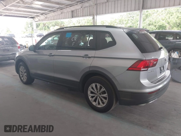 2019 Volkswagen Tiguan S with VIN 3VV1B7AX6KM189497, listed as a IAAI auction lot 42669313 with 236,719 mi miles and . Bid and sale history available at DreamBid. Image 14.