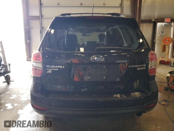 2015 Subaru Forester Touring with VIN JF2SJAUC0FH467740, listed as a Copart auction lot 50028885 with 131,830 mi miles and Clean Title. Bid and sale history available at DreamBid. Image 6.