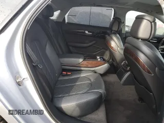 2015 Audi A8 3.0T z VIN WAU3GAFD7FN008548, wystawiony jako Copart lot #50428525 z przebiegiem 128 457 mil mil oraz Czysty tytuł • Clean title. Historia ofert i sprzedaży dostępna na DreamBid. Obrazek 10.