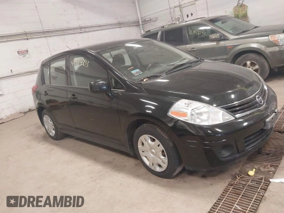 2012 Nissan Versa S with VIN 3N1BC1CP9CK248665, listed as a IAAI auction lot 41974293 with 146,465 mi miles. Bid and sale history available at carsss.com. Image 1.