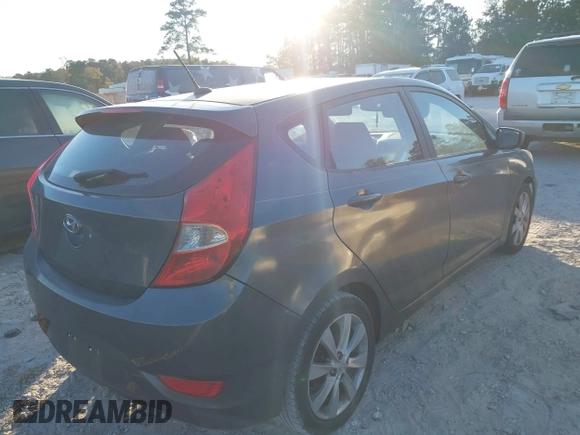2012 Hyundai Accent SE with VIN KMHCU5AE6CU024465, listed as a IAAI auction lot 41591162 with 168,574 mi miles. Bid and sale history available at carsss.com. Image 4.