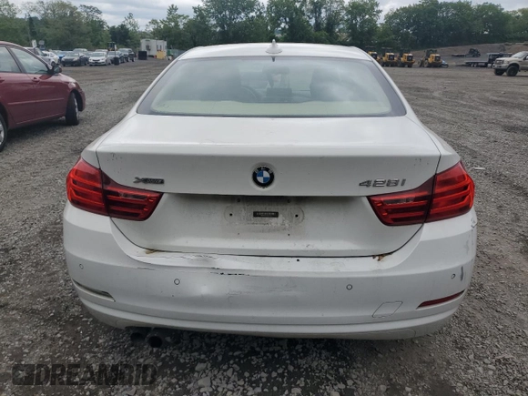 2015 BMW 4 Series 428i xDrive z VIN WBA3N9C59FK246615, wystawiony jako Copart lot #58202885 z przebiegiem 98 570 mil mil oraz Szkoda całkowita • Salvage title. Historia ofert i sprzedaży dostępna na DreamBid. Obrazek 6.