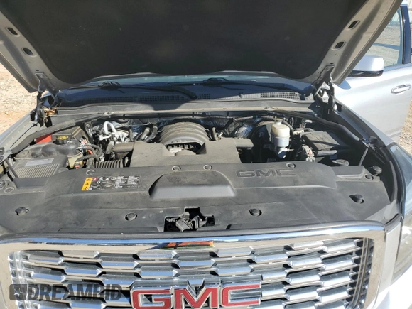 2018 GMC Yukon Denali with VIN 1GKS1CKJ0JR241040, listed as a Copart auction lot 47592655 with 133,737 mi miles and Salvage Title. Bid and sale history available at carsss.com. Image 13.