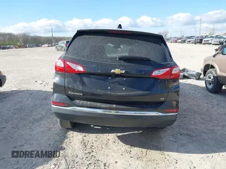 2020 Chevrolet Equinox LT with VIN 2GNAXKEV6L6197615, listed as a IAAI auction lot 42033417 with 100,449 mi miles and . Bid and sale history available at carsss.com. Image 16.