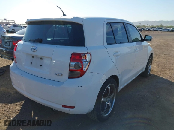 2011 Scion xD with VIN JTKKU4B49B1012447, listed as a IAAI auction lot 42026584 with 223,863 mi miles. Bid and sale history available at carsss.com. Image 4.