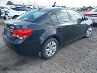 2015 Chevrolet Cruze LS with VIN 1G1PA5SG2F7164605, listed as a IAAI auction lot 41906950 with 119,161 mi miles. Bid and sale history available at carsss.com. Image 4.
