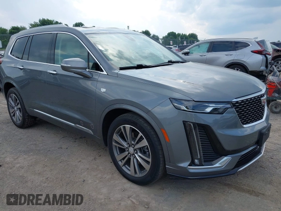 2021 Cadillac XT6 Premium Luxury with VIN 1GYKPDRS9MZ118642, listed as a IAAI auction lot 42664965 with 65,566 mi miles and . Bid and sale history available at DreamBid. Image 1.